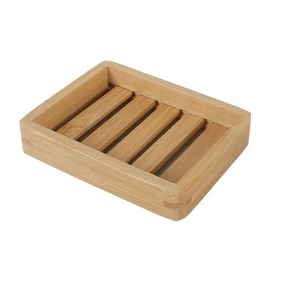 Light brown bamboo soap holder with slotted surface