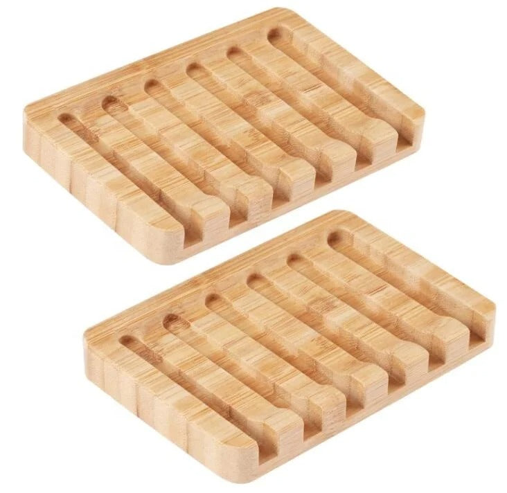 Light brown bamboo soap holder with slotted surface