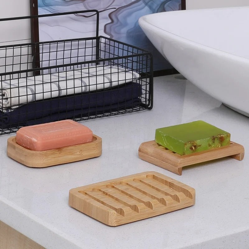 Light brown bamboo soap holder with slotted surface