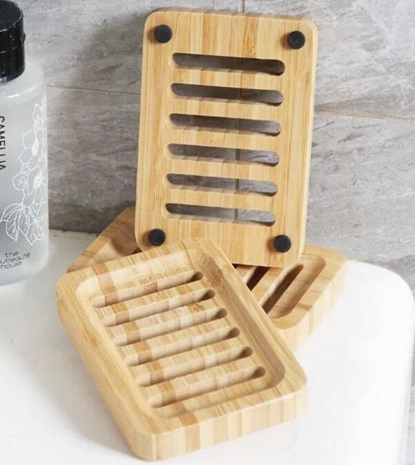 Light brown bamboo soap holder with slotted surface