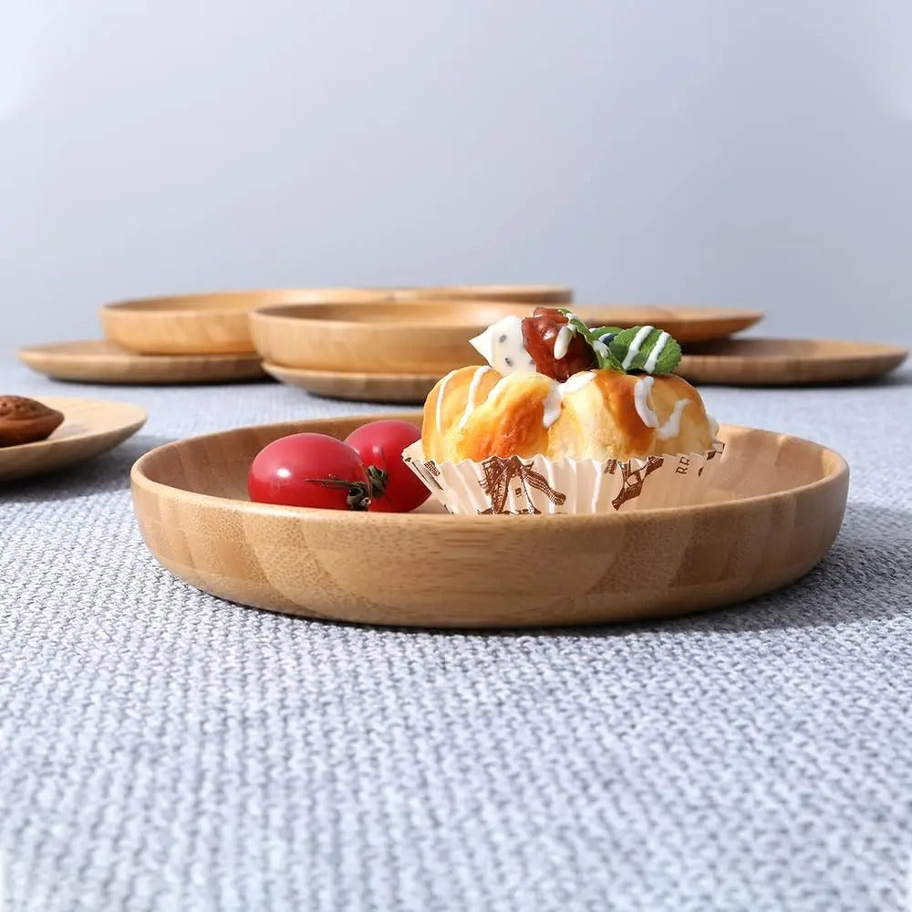 Round light brown bamboo plate with raised edge
