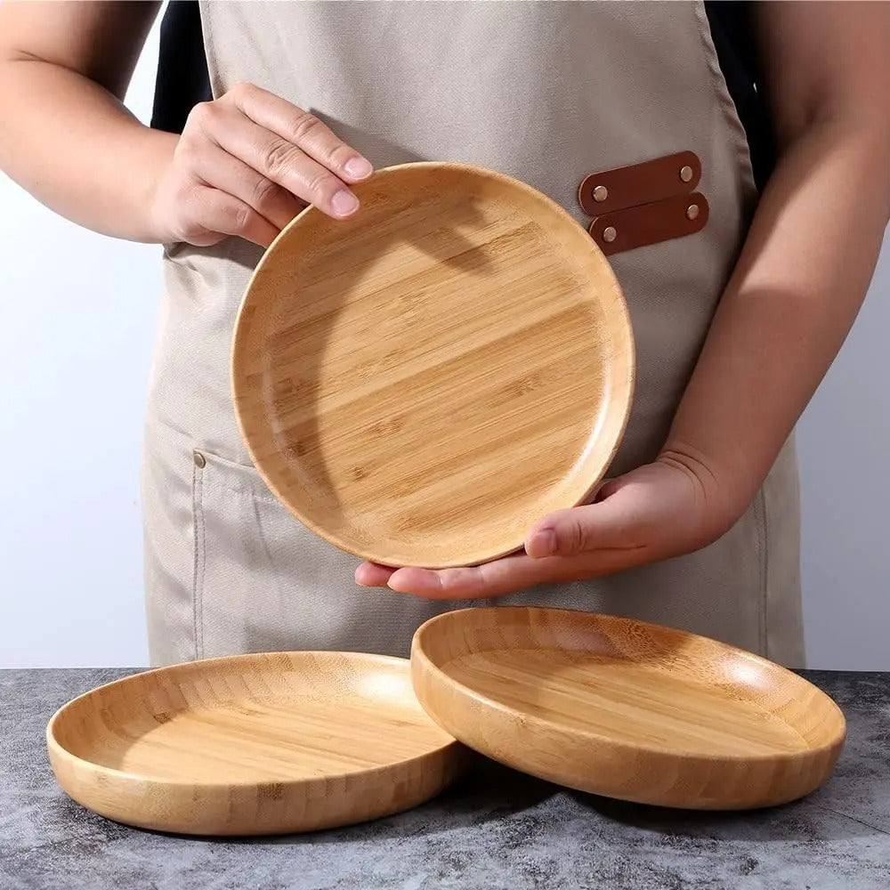 Round light brown bamboo plate with raised edge